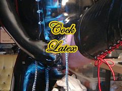 I sensuously stroke my hard cock wrapped in chains with my swollen, cum filled balls squeezed into tight latex while my tight hole sucks on an anal plug lollipop. With anal plug pleasure filling my tight ass I shoot hot cum all over my latex.