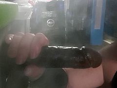 Gagging on black toys with sloppy smoking blowjob