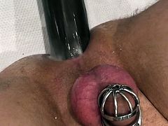 Chastity slut fucked by sex machine