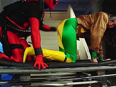 This group of cosplayers decide to rent a place together for the night and sleep there, but looks like spiderman has other intentions, as he brings the petite babe to the stairs, and proceeds to pound her pussy there, before Deadpool finds out and joins in by stuffing his hard cock down her throat