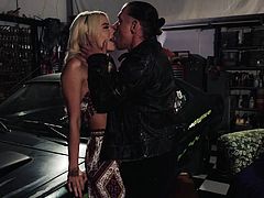 This petite blonde asked a mechanic to come to her garage and take a look at her car but when the horny dude arrived, he seemed only interested in her instead and ended up seducing her, after which he placed her on top of the car to eat her out and bang her mercilessly before making her suck him off