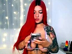 Amateur redhead poses and masturbates with toys
