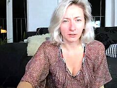 Blonde with big boobs fucked from behind before tit wanking